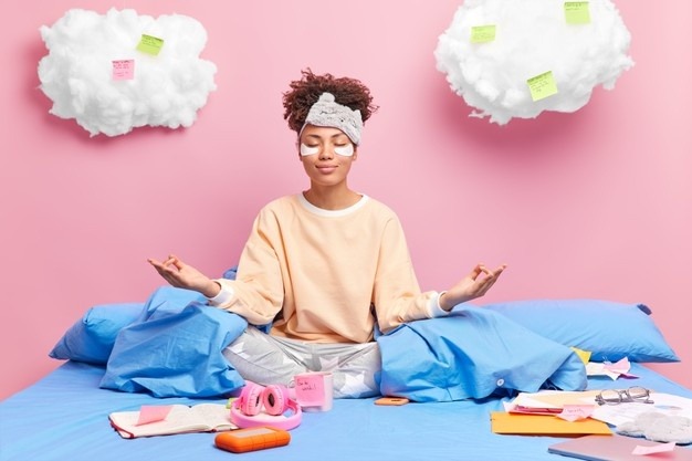 https://www.freepik.com/free-photo/pleased-african-american-woman-meditates-bed-feels-relaxed-wears-nightwear-closes-eyes-practices-yoga-after-studying-drinks-coffee_13884387.htm#query=sleep%20meditation&position=1&from_view=search