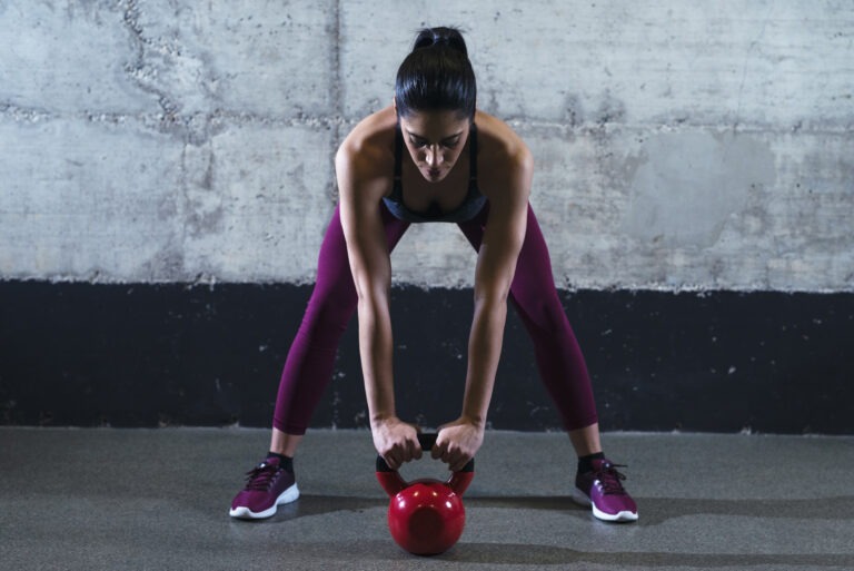 https://www.freepik.com/free-photo/fitness-woman-sports-clothes-exercising-with-kettle-bell-weight-gym_11030444.htm