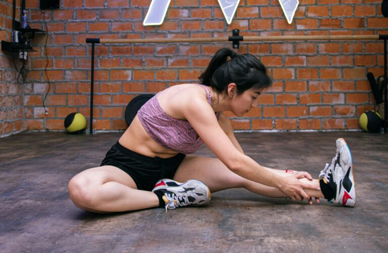 Photo by Ali Alcántara from Pexels: https://www.pexels.com/photo/photo-of-a-stretching-woman-14591558/
