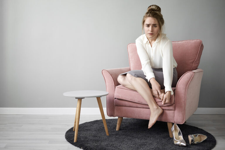 https://www.freepik.com/free-photo/modern-hardworking-young-female-feeling-tired-after-long-walk-high-heeled-shoes-sitting-barefooted-armchair-massaging-her-feet-having-painful-frustrated-facial-expression-health-wellness_11696391.htm